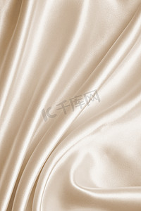 背景窗帘摄影照片_光滑优雅的金色丝绸作为婚礼背景。