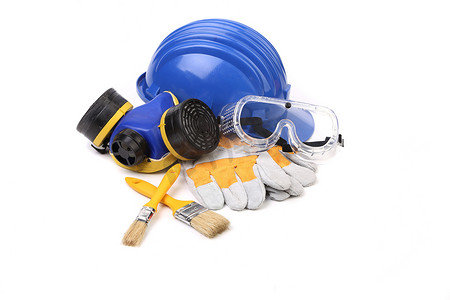 带安全头盔摄影照片_带呼吸器和护目镜的蓝色安全头盔。