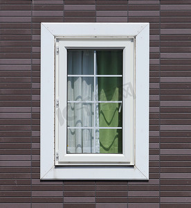 带窗户的砖墙摄影照片_带砖墙的现代窗户