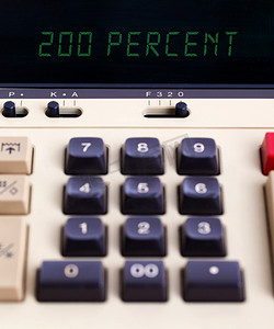 200美金摄影照片_显示百分比的旧计算器 — 200%