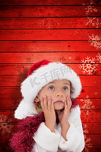 戴着圣诞帽和金属丝的可爱小女孩的合成图像