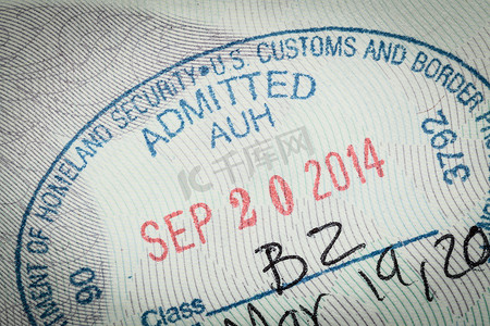 护照签证摄影照片_美国美国签证的认可印章用于移民旅行 conce