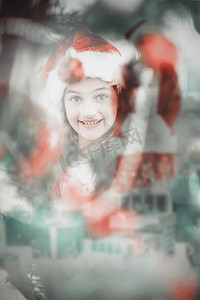 快乐圣诞老人对着相机微笑的合成图像的合成图像