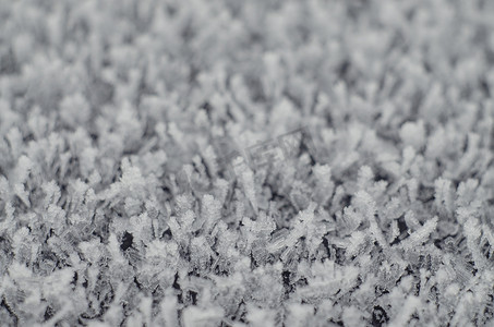 晶体纹理摄影照片_带纹理的冬季背景由晶体制成。