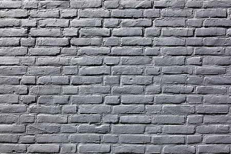 一部分的灰色被绘的砖墙