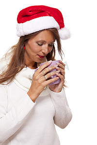 戴着圣诞帽喝着咖啡茶的冷漠年轻女人