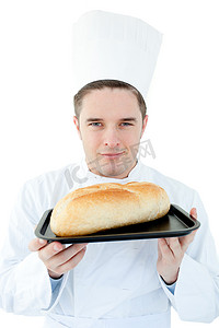 厨师动画摄影照片_有魅力的男厨师拿着面包对着镜头