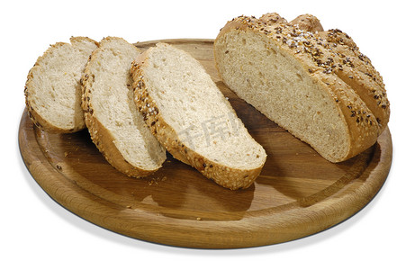必然性摄影照片_板上有谷物的孤立面包