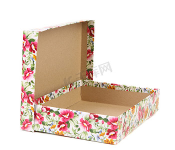 礼物盒子打开摄影照片_打开印有鲜花的盒子作为礼物。
