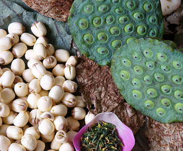 莲子茶摄影照片_收集莲花、种子、茶、健康食品