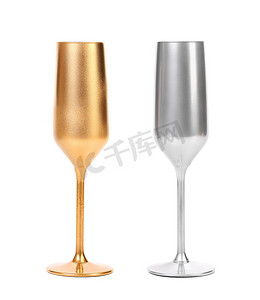 银色流沙摄影照片_金色和银色香槟酒杯。