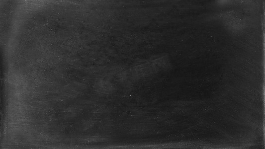 教室背景墙摄影照片_学校黑板的空脏表面用于书写。纹理或背景。