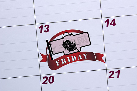 天猫元素摄影照片_办公室日历标记为 13 号星期五