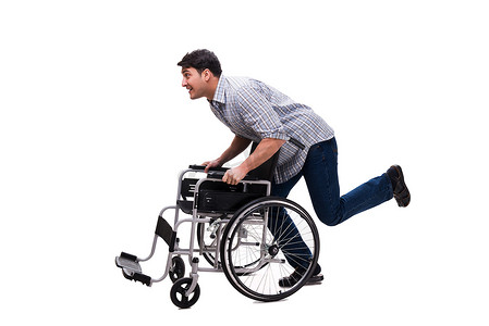 可回收摄影照片_坐在轮椅上的看护者被白色隔离