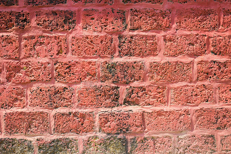 垃圾粉红色墙的背景纹理墙