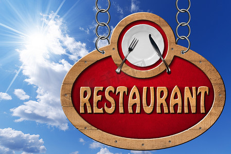 餐厅招牌摄影照片_带金属链的餐厅标志