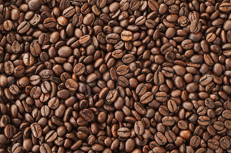 咖啡纹理摄影照片_烤咖啡豆，背景纹理