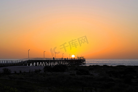 日落大海摄影照片_澳大利亚阿德莱德日落时的拉格湾码头