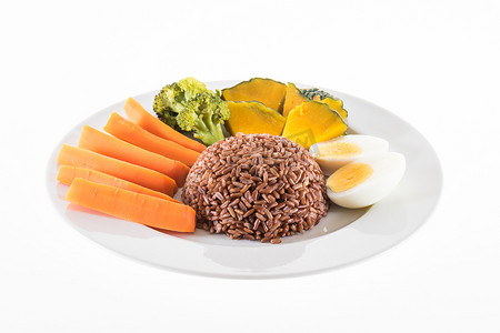 南瓜食物摄影照片_素食，包含糙米、鸡蛋、红萝卜、南瓜和