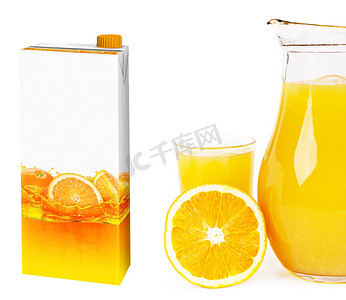 纸盒果汁摄影照片_玻璃盒和纸盒中的新鲜橙汁