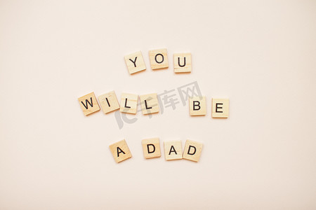 健康家庭海报摄影照片_题词“你将成为一个爸爸”