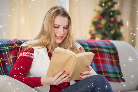 圣诞节时金发美女看书的合成图像