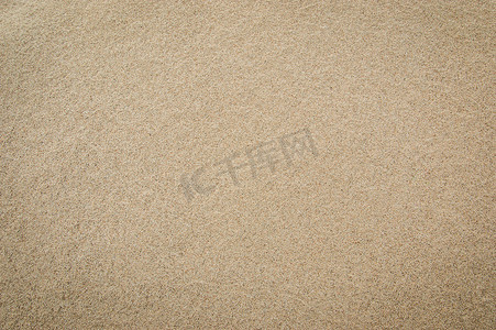 金色纹理摄影照片_背景的沙子纹理。