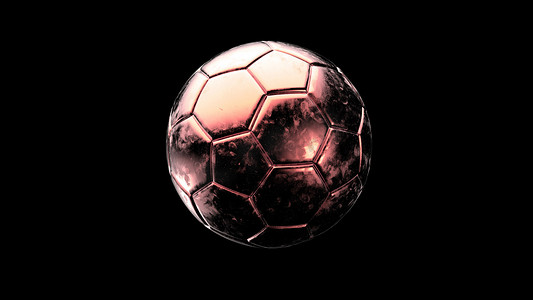 孤立在黑色背景上的红色足球金属球。