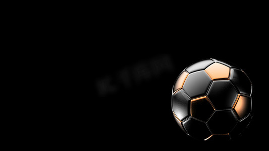 孤立在黑色背景上的橙色和黑色足球金属球。
