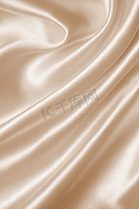 光滑优雅的金色丝绸作为婚礼背景。