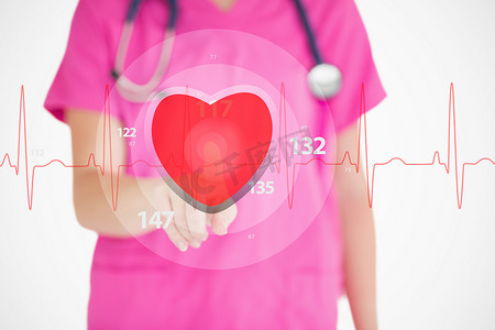 穿着粉色磨砂膏的护士触摸带有心脏图形的红色心电图线