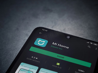 app页面摄影照片_Mi Home 应用程序在黑色移动 sma 的显示屏上播放商店页面