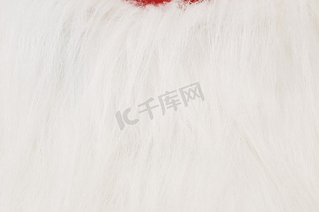 圣诞老人白胡子摄影照片_圣诞老人的白胡子。