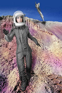 蓝色宇航员摄影照片_宇航员时尚站女人太空服头盔