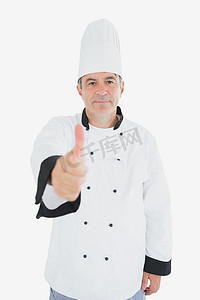 成熟的厨师竖起大拇指