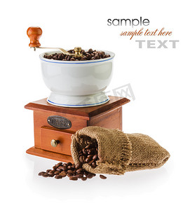 咖啡机和咖啡豆摄影照片_研磨机和咖啡豆