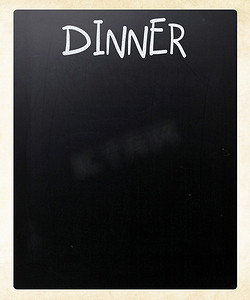 “”“晚餐””用白色粉笔在黑板上手写”
