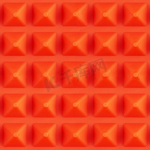 红色硅胶金字塔形烹饪垫的无缝方形纹理