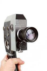 手中的旧 8 毫米电影摄影机