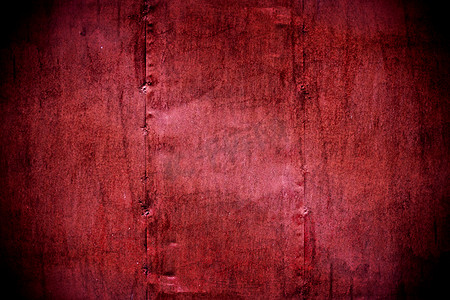金属漆成深红色的墙壁纹理