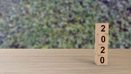 2020 年数字单词木制立方体在桌子上垂直于背景留下绿色高清，模型，模板，带有文本复制空间的横幅，新年快乐设计概念。