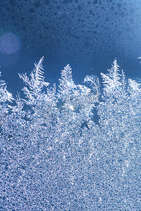 窗户冬天摄影照片_冰霜窗