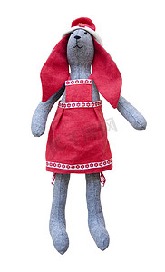 孤立的手工娃娃兔，红耳朵，围着红围裙