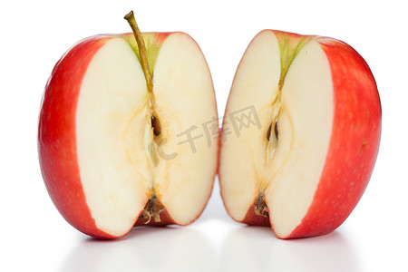 新鲜的苹果摄影照片_切半的苹果