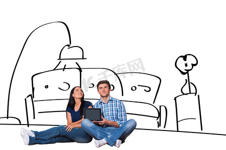 年轻夫妇坐在地板上用平板电脑的合成图像