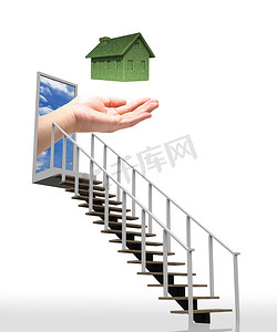 用手通往绿色生态住宅概念的阶梯。