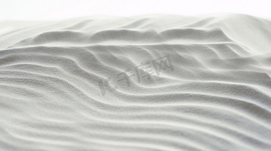 海滩上白沙波纹的抽象背景