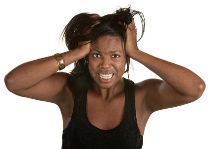 生气摄影照片_愤怒的女人拉头发