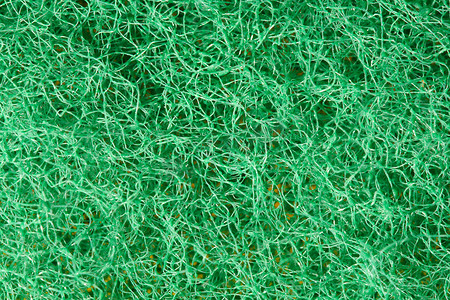 绿色浮雕摄影照片_泡沫橡胶宏观的绿色纹理