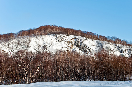 下雪感冒摄影照片_雪山